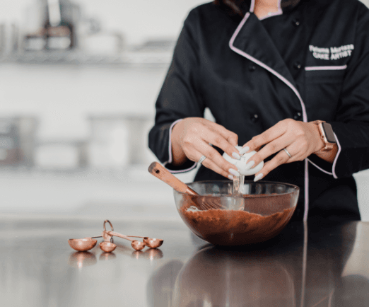 Fatema baking in her kitchen