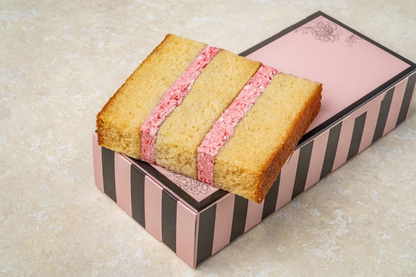 Vanilla Raspberry Buttercream Cake Slice